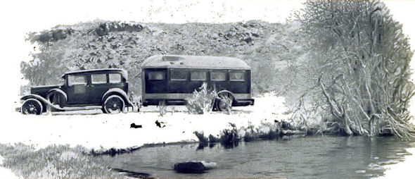 A "home on wheels" on a Nevada road in winter.  Built-in heating and air-conditioning provide comfort under all climatic conditions.